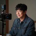 배우 백일섭이 드라마 촬영장에서 웃고 있는 모습