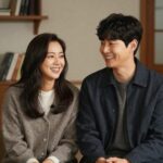 이윤철 아나운서와 아내 조병희가 함께 웃고 있는 따뜻한 모습