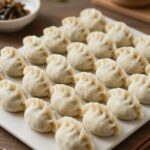 생생정보통 맛집 오늘 방송 추천 식당 3곳 수원 정초손만두에서 제공되는 만두전골과 모둠전이 담긴 테이블 사진