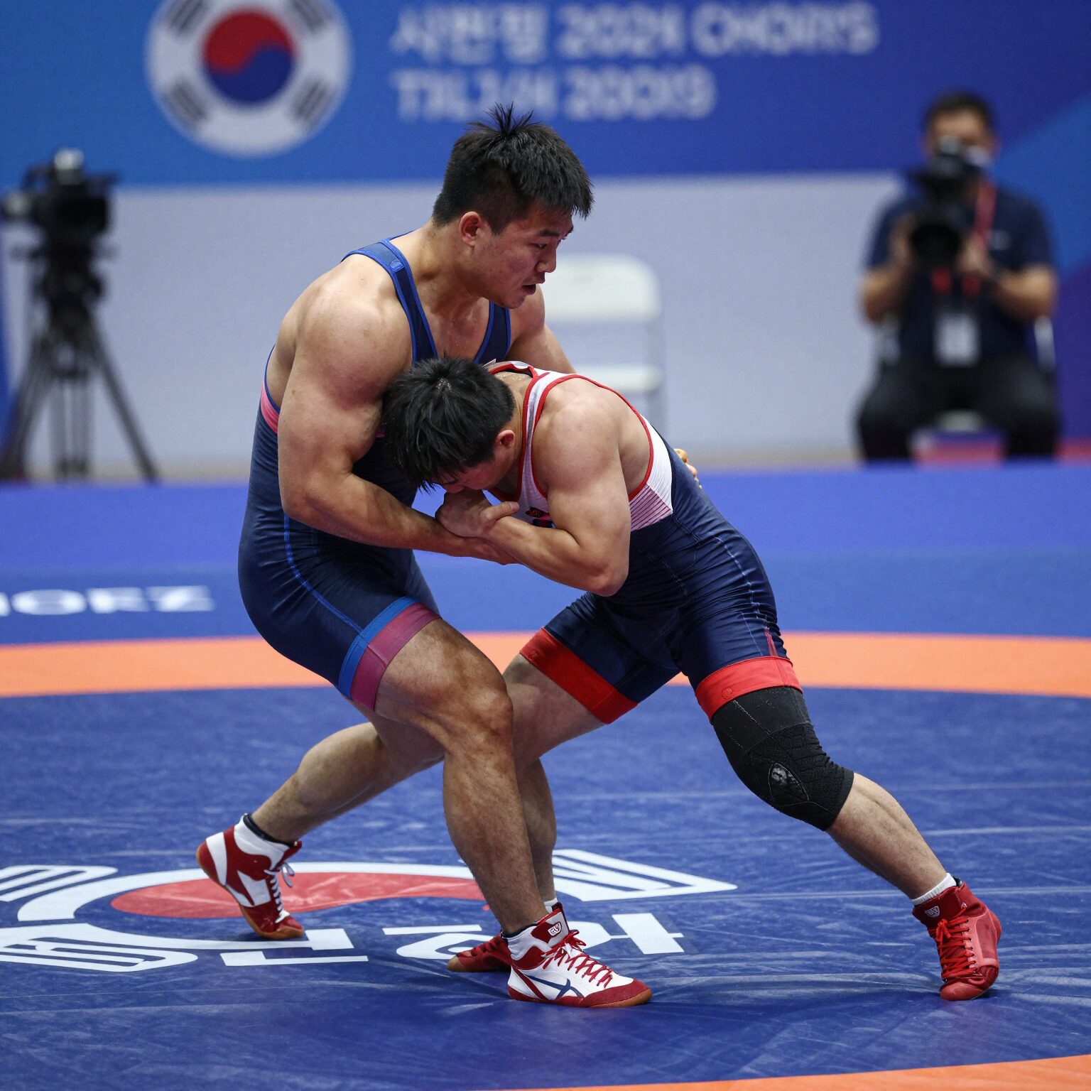 씨름선수 김민재가 경기에서 힘을 발휘하는 모습